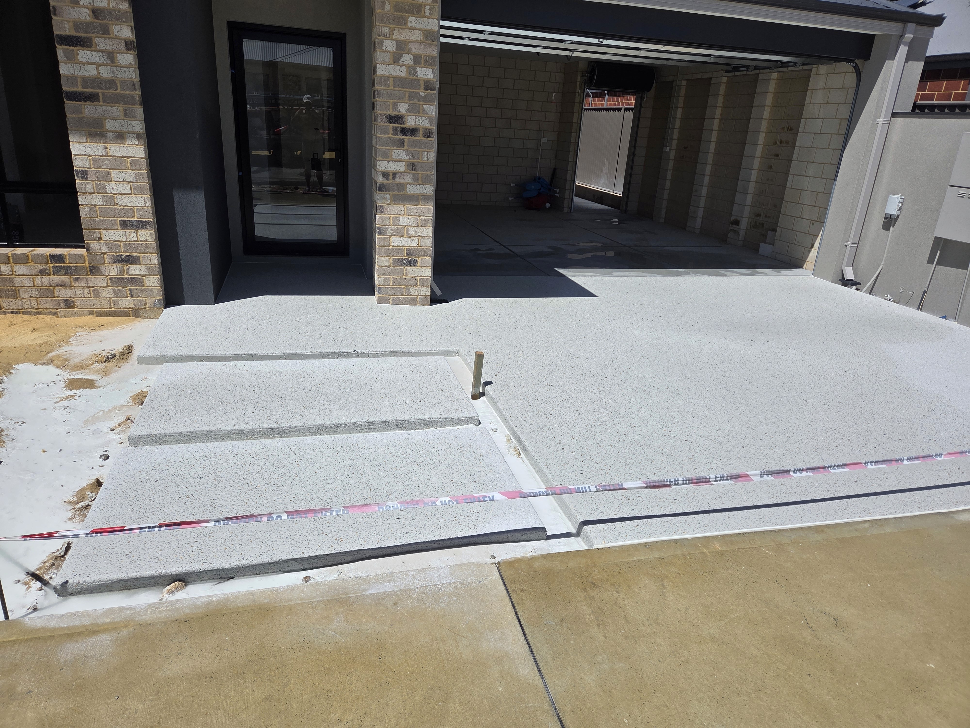 A happy customer smiling wearing orange headband