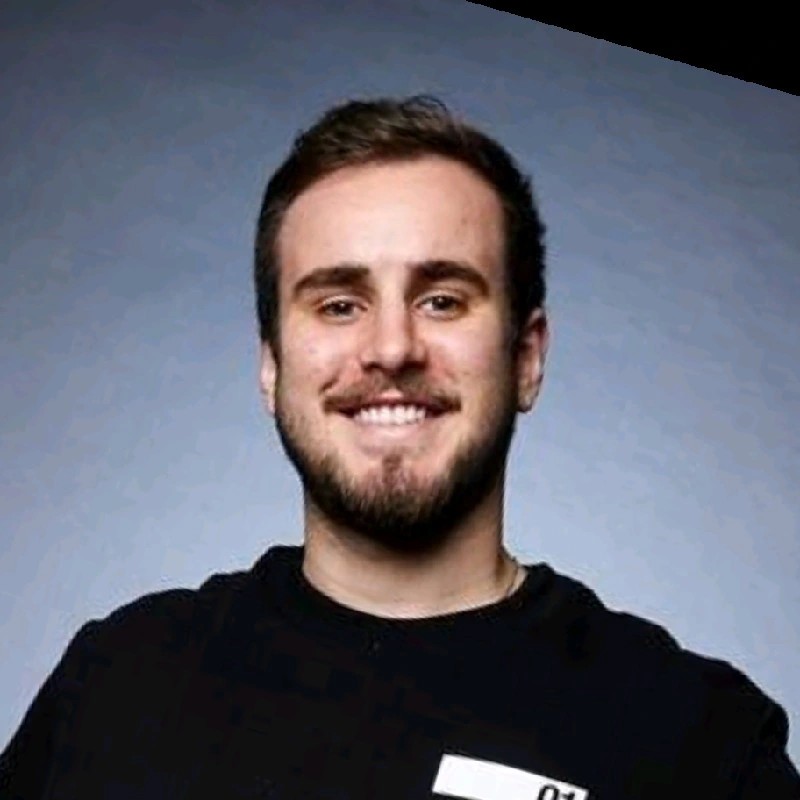 woman in black long sleeve shirt sitting on white couch