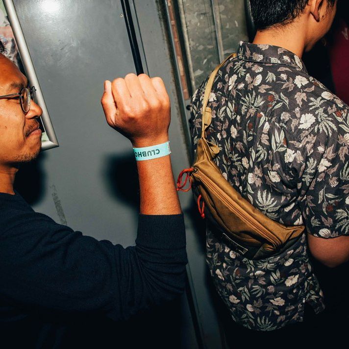women in an orange car