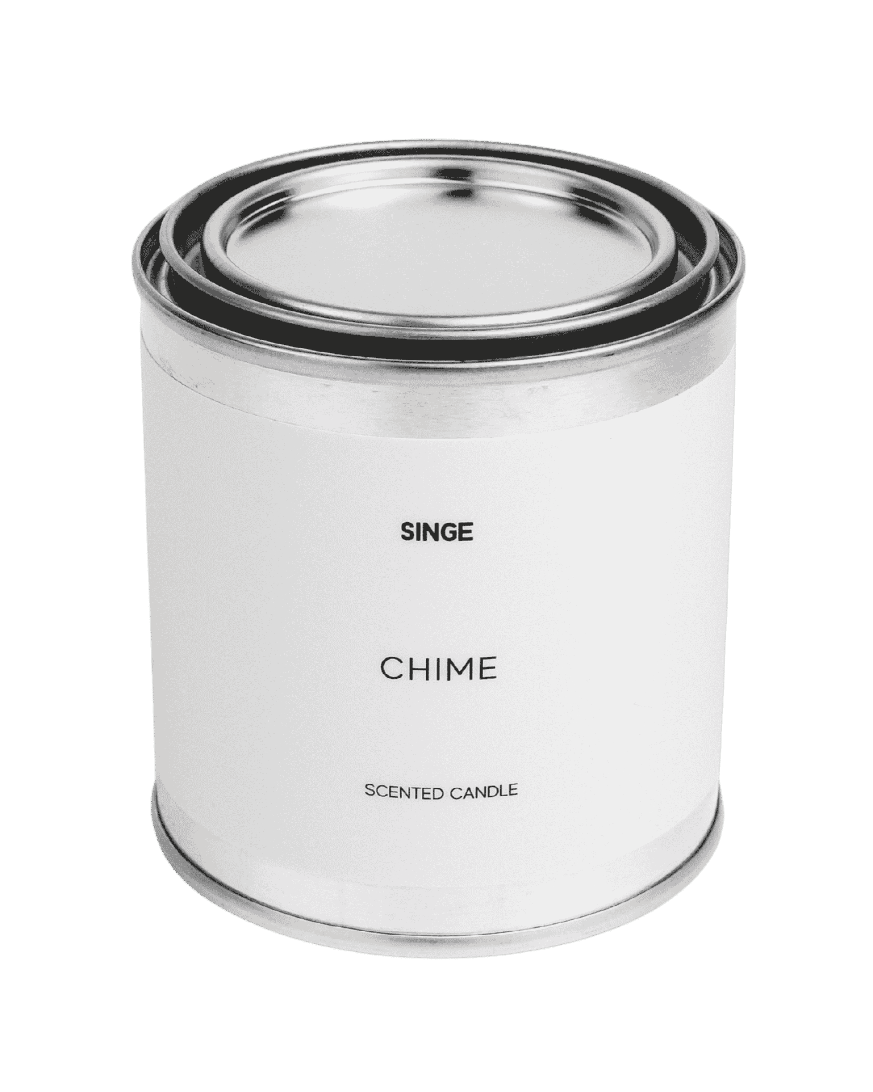 A scented candle in a cylindrical metal vessel with lid, the off white label reads "SINGE CHIME SCENTED CANDLE"