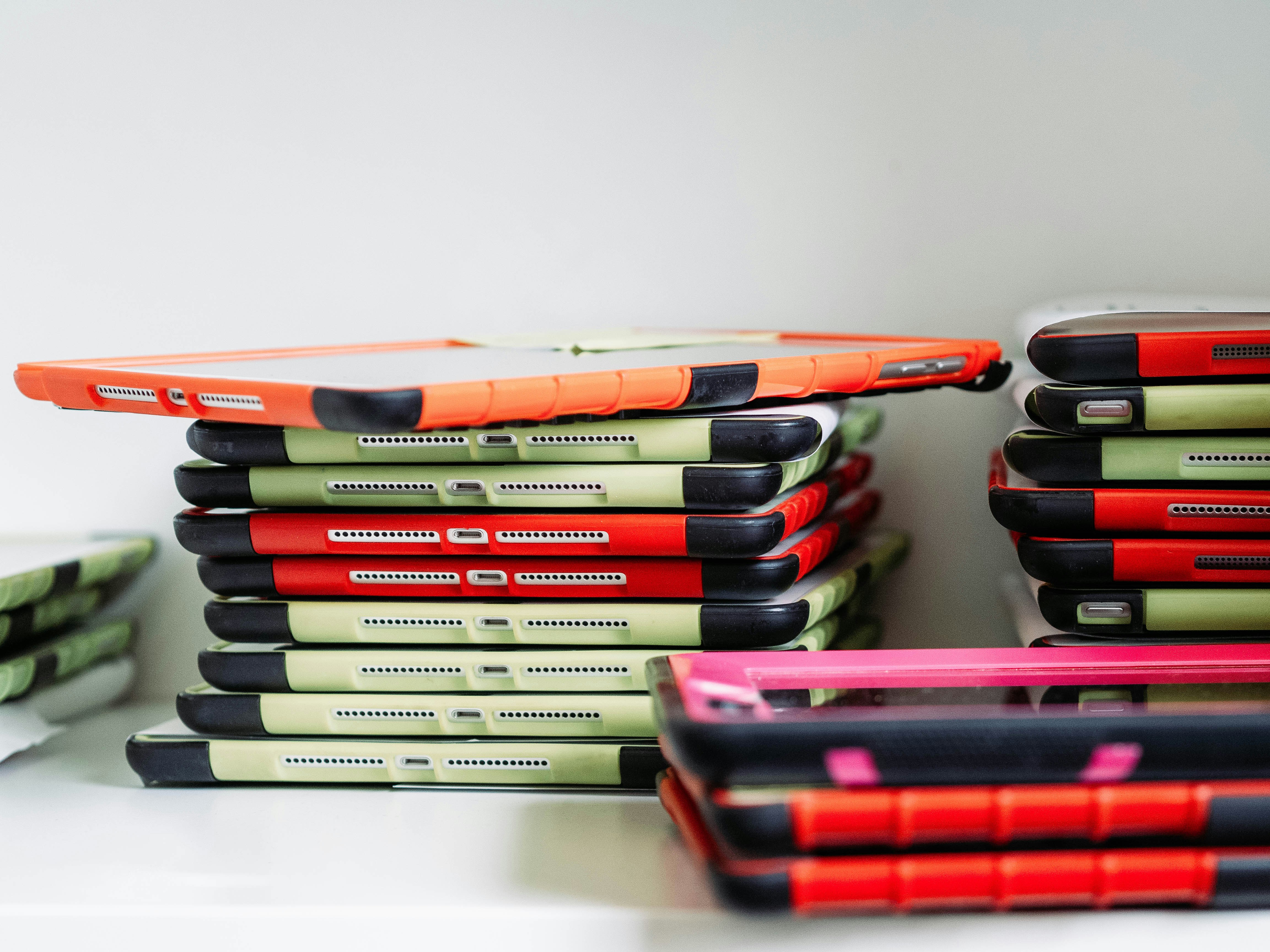 ipads stacked on each other