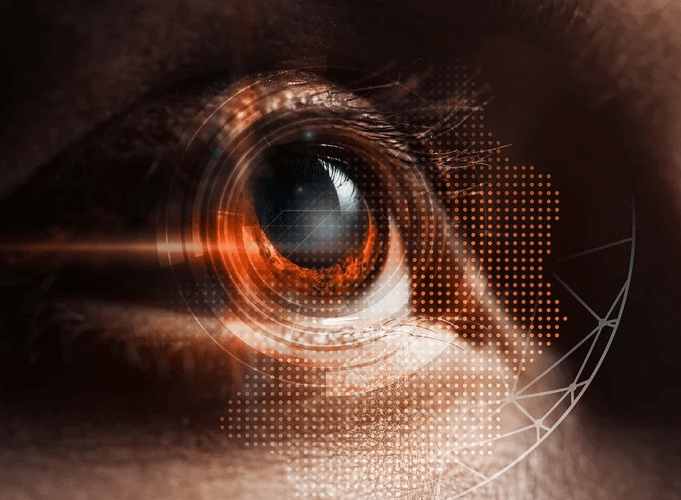 Olho com íris laranja enxergando painéis digitais