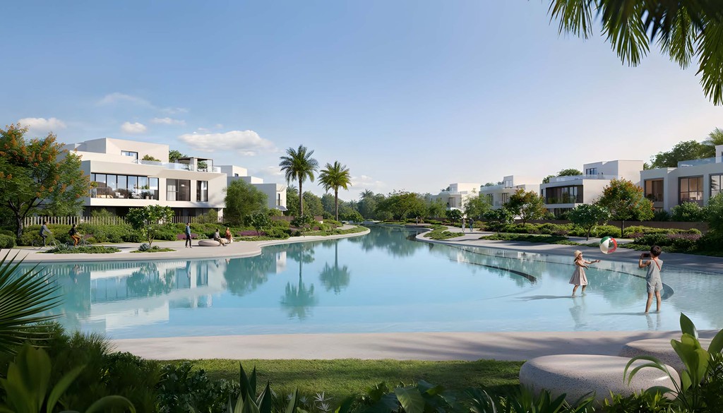 A serene swimming pool nestled among lush green plants at Address Villas Tierra.