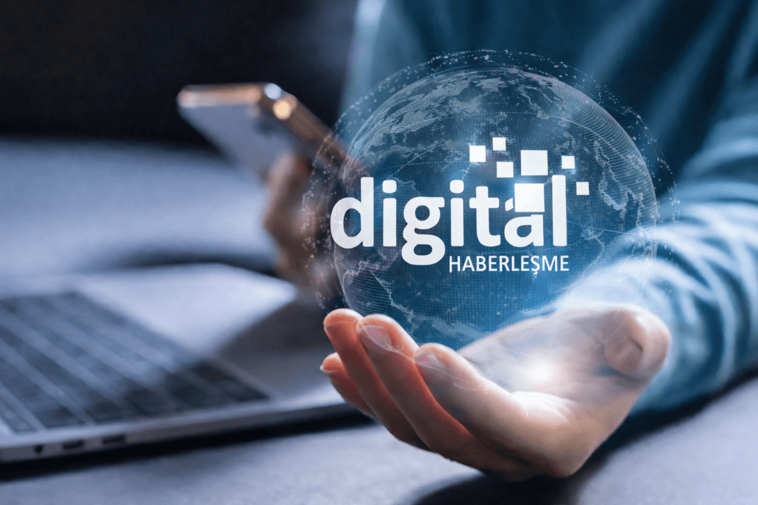 Tall radio tower on a hill at dusk