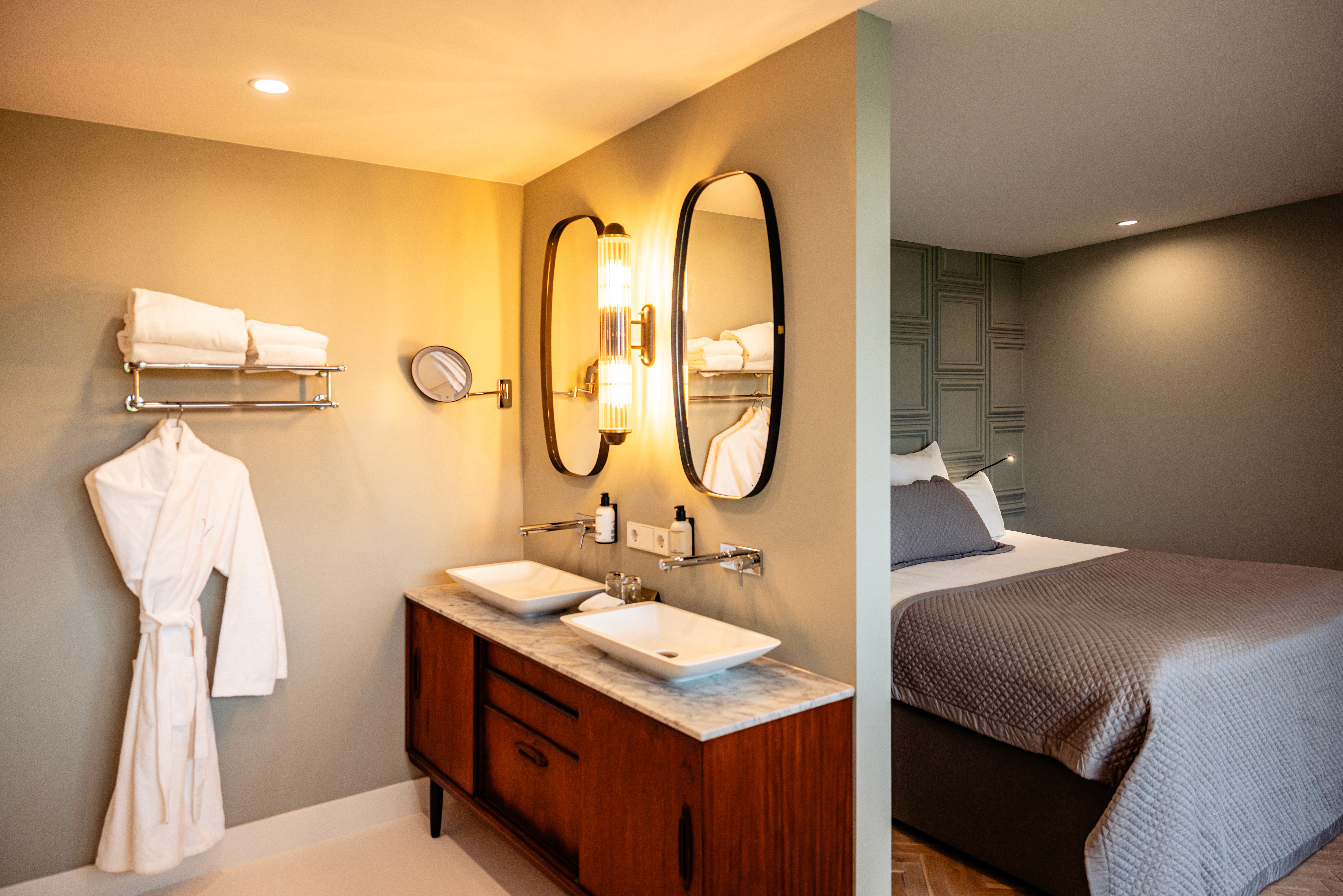 Sage green walls bedroom with lilac duvet and modern style