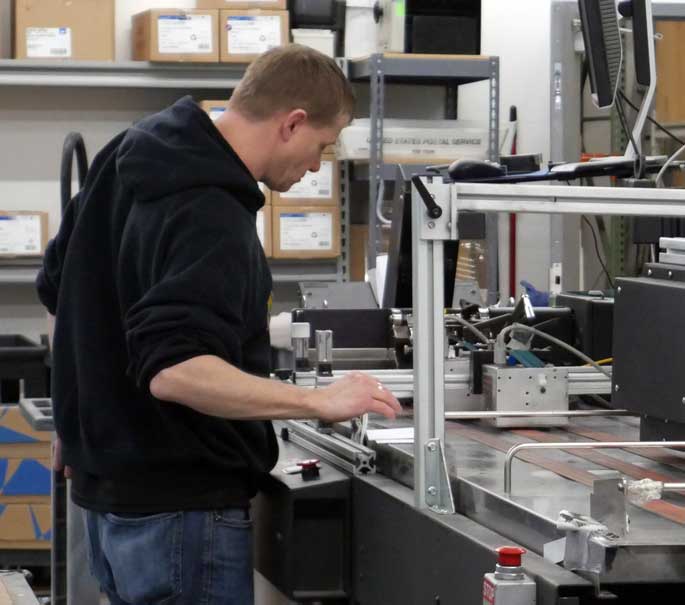 employee preparing a print job