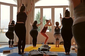 black laptop computer on brown wooden table