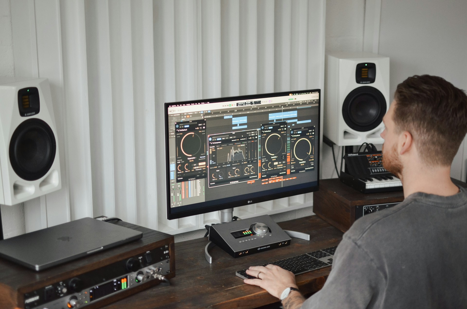 person editing song - How To Create A Rap Song