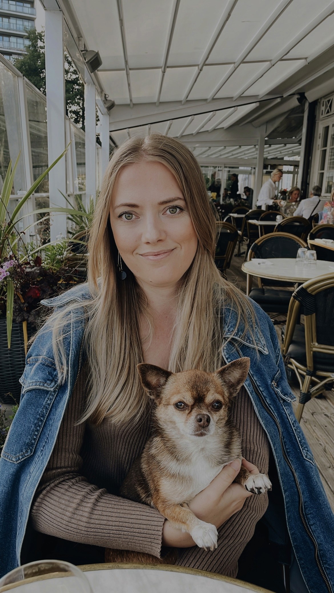 a blurry photo of a person standing in front of a wall