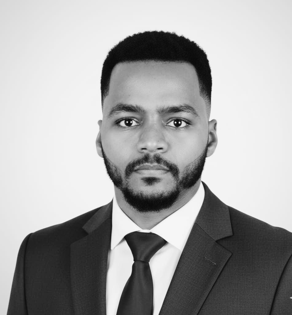 Woman standing between large rock formations