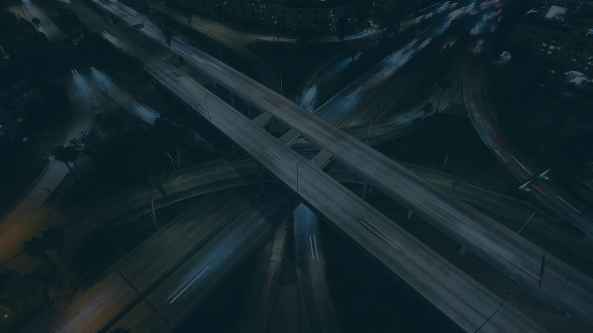 Busy crossroads at night