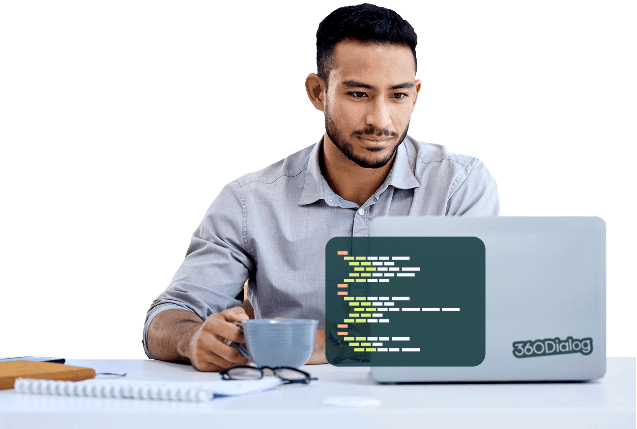 Um desenvolvedor focado trabalhando em um laptop, implementando soluções WhatsApp Business e integração de API
