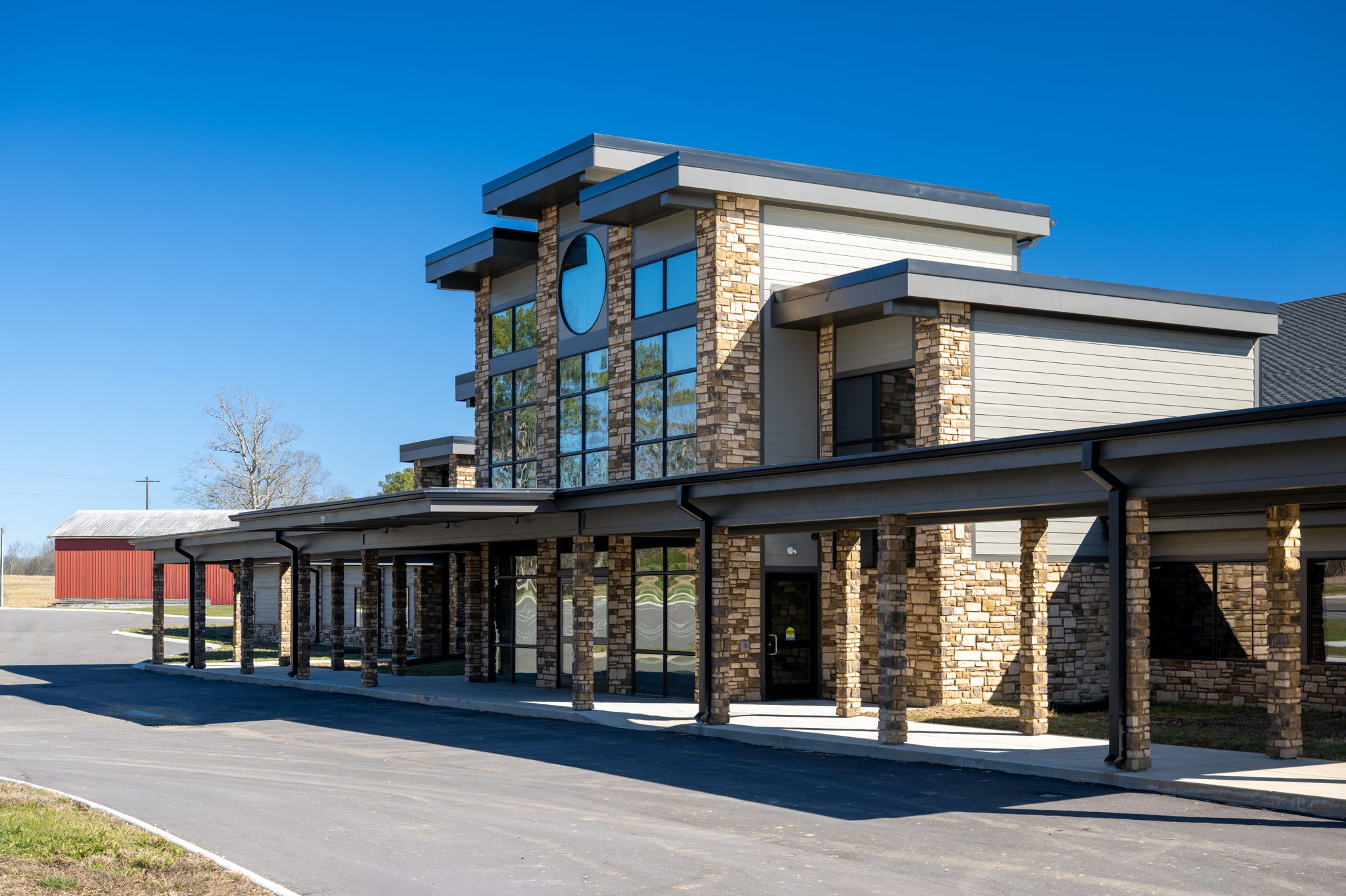 Multi-story commercial bulding with stone exterior