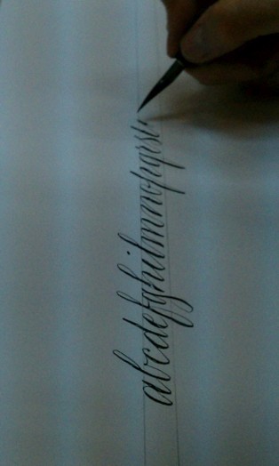 caligraphy writing with a pen