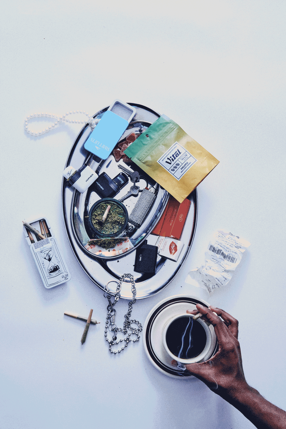 A person walks past buildings on a city street.