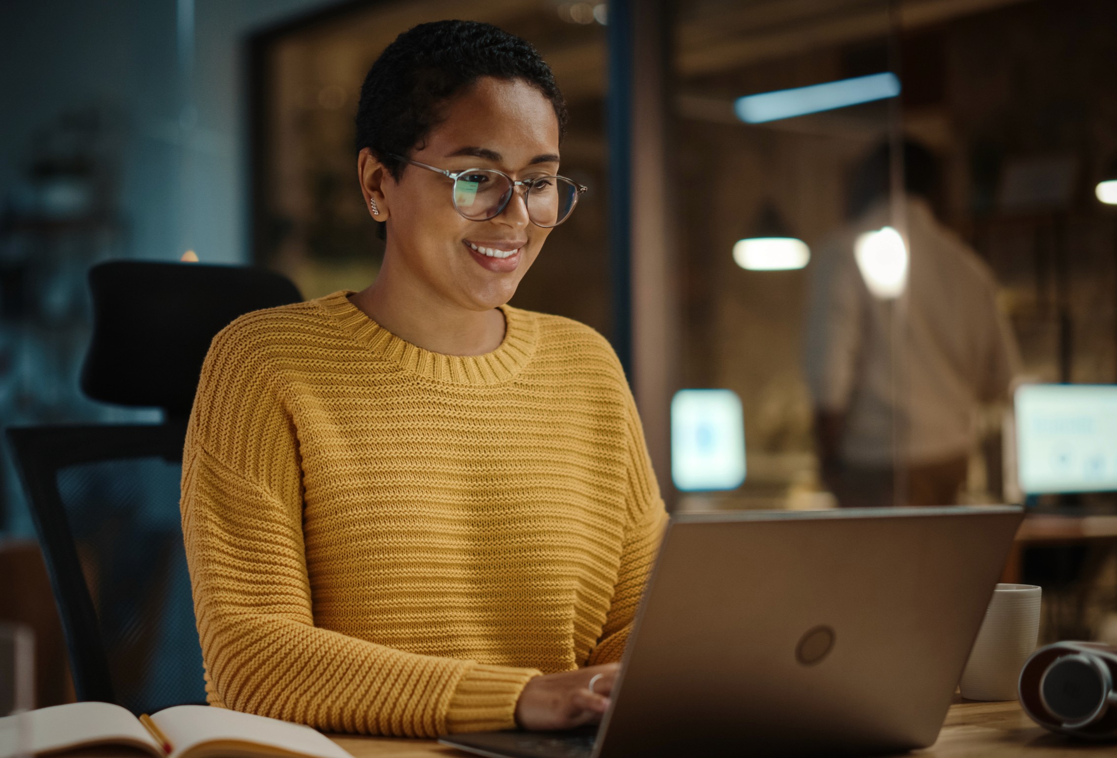 Woman Looking at Laptop