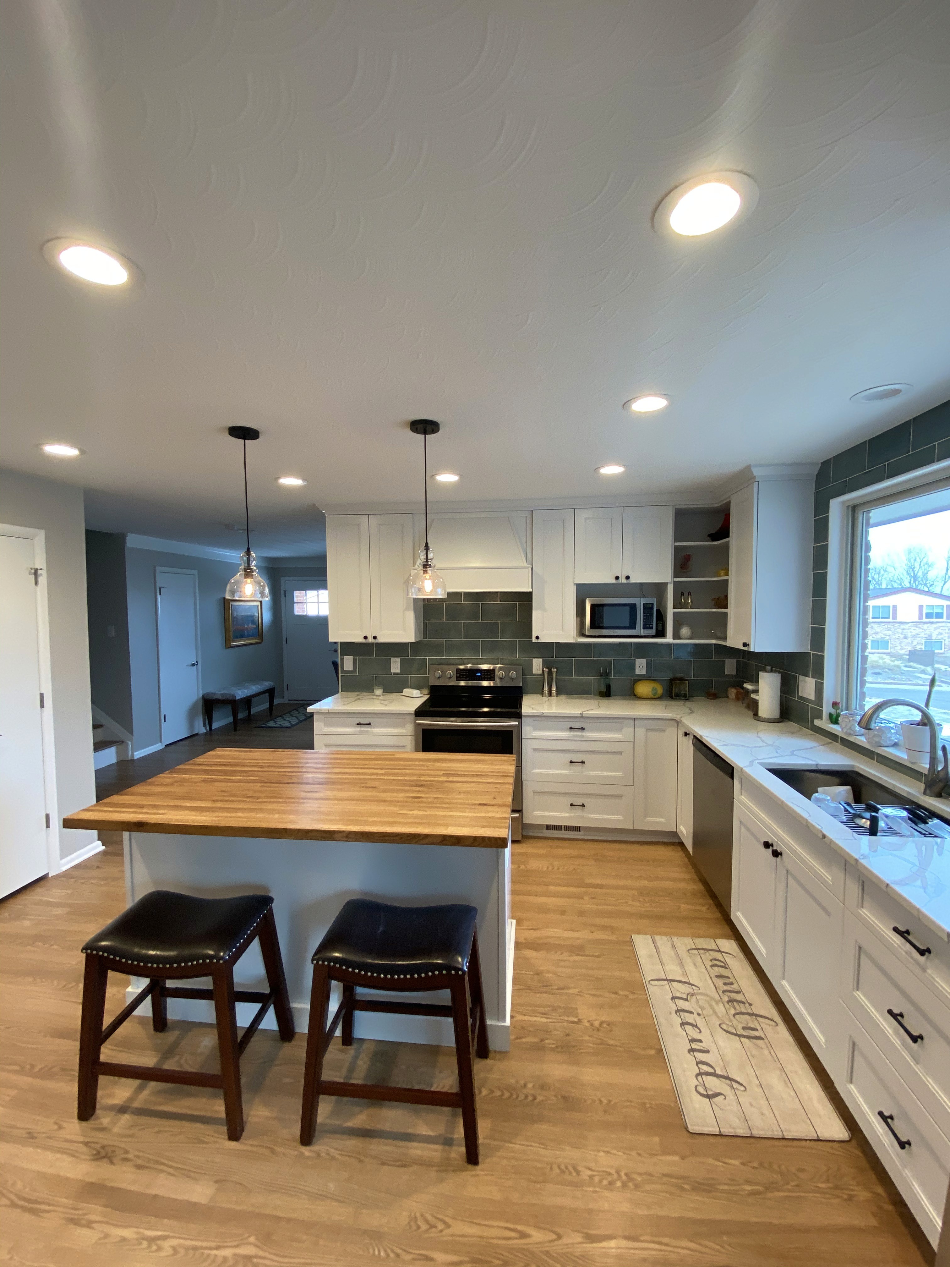 white and brown wooden table with chairs