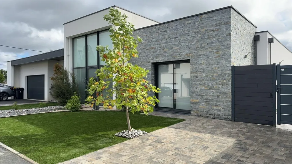 Beautiful landscaped garden with greenery and outdoor design elements.