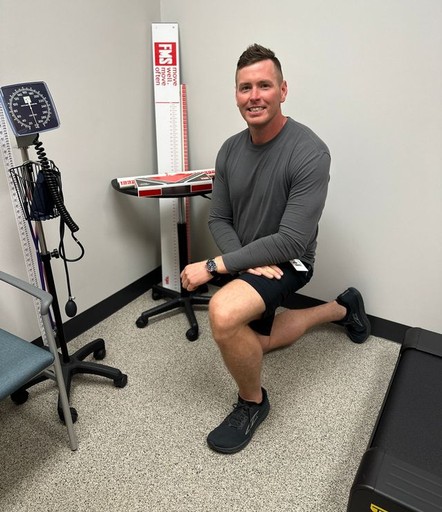 Nate LeBlanc demonstrating a half-kneeling movement position