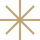 Um design decorativo em forma de estrela com uma cor dourada.