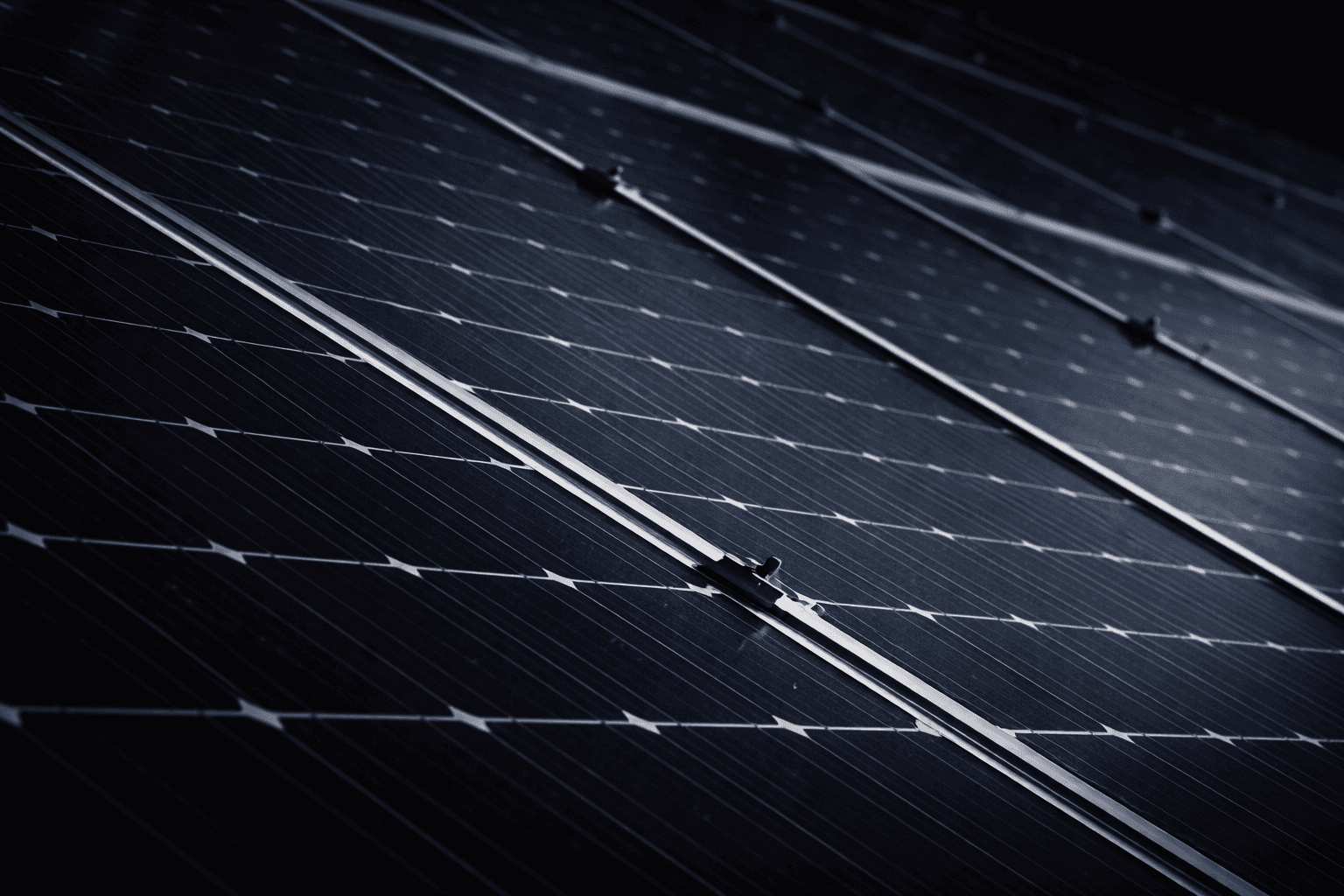 several rows of solar panels on a roof