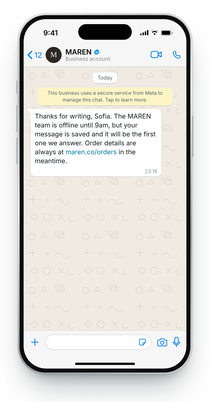 Replying after closing time: WhatsApp greeting message on an iPhone
