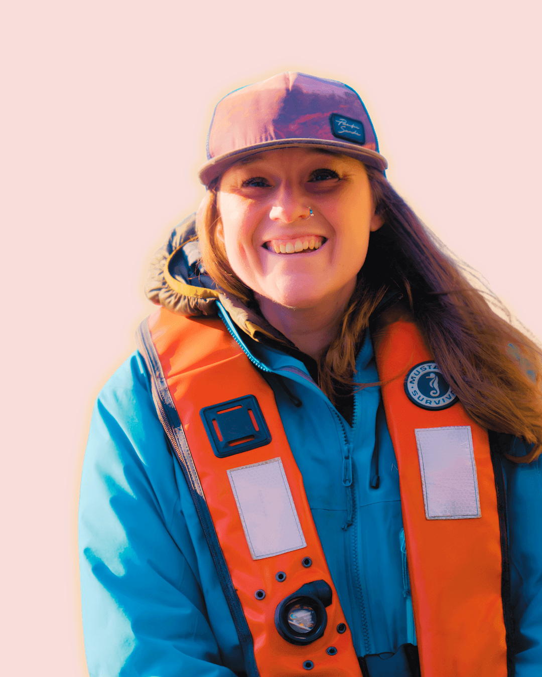 Chloé Dubois of Ocean Legacy on a boat, with a city skyline behind