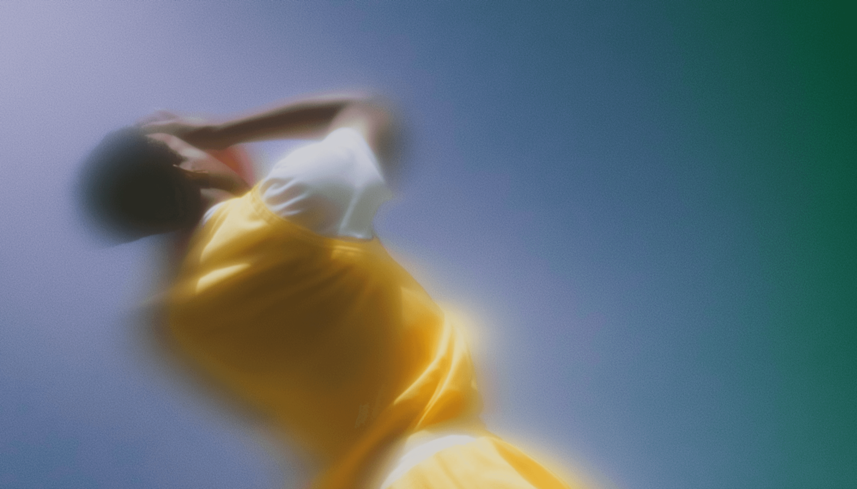 Abstract portrait of a person in a yellow dress.