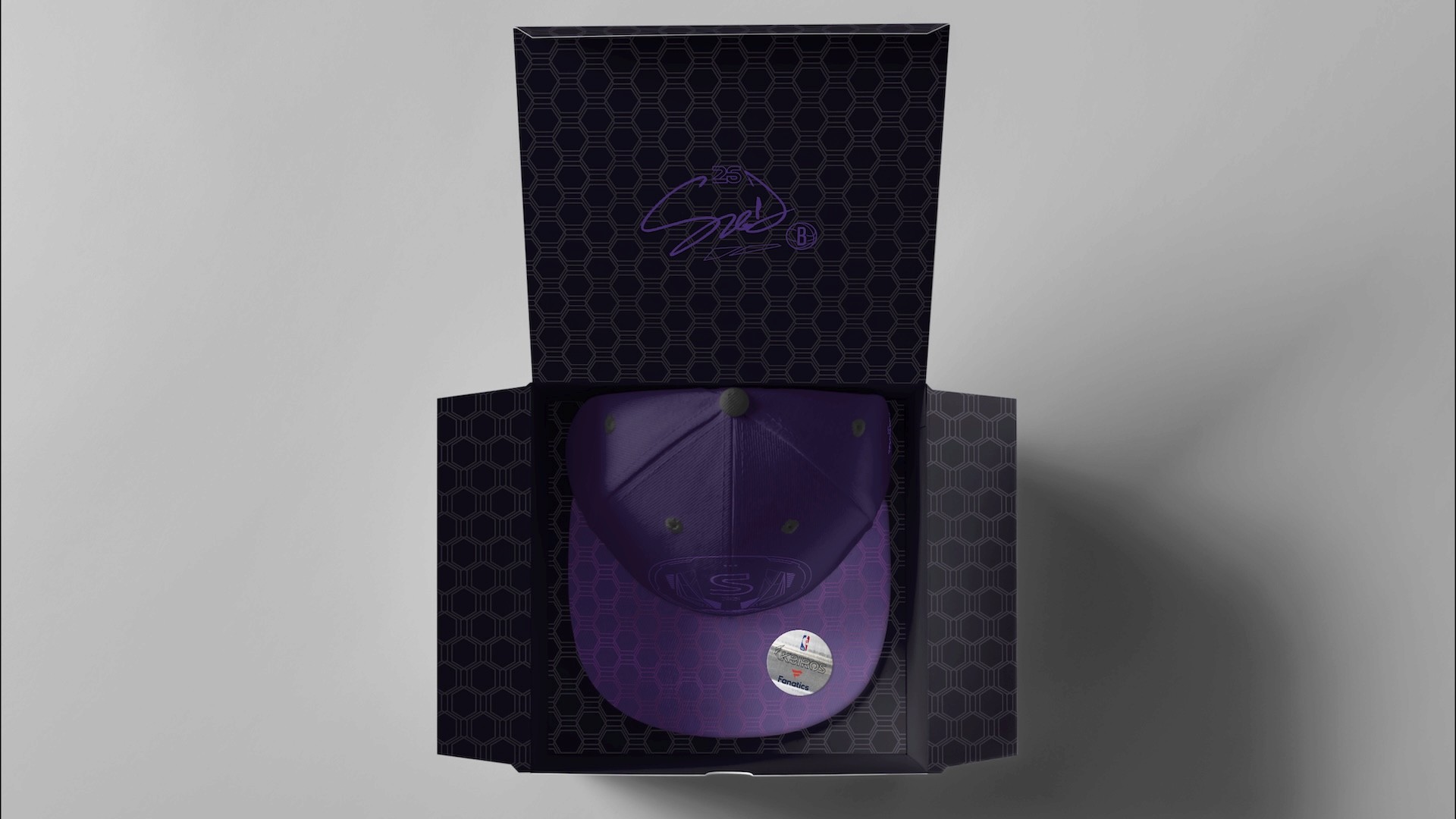 SGD.26 The Mayor purple snapback hat displayed in premium hexagon pattern gift box with Spencer Dinwiddie signature on interior lid