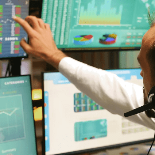 person writing on a piece of paper 