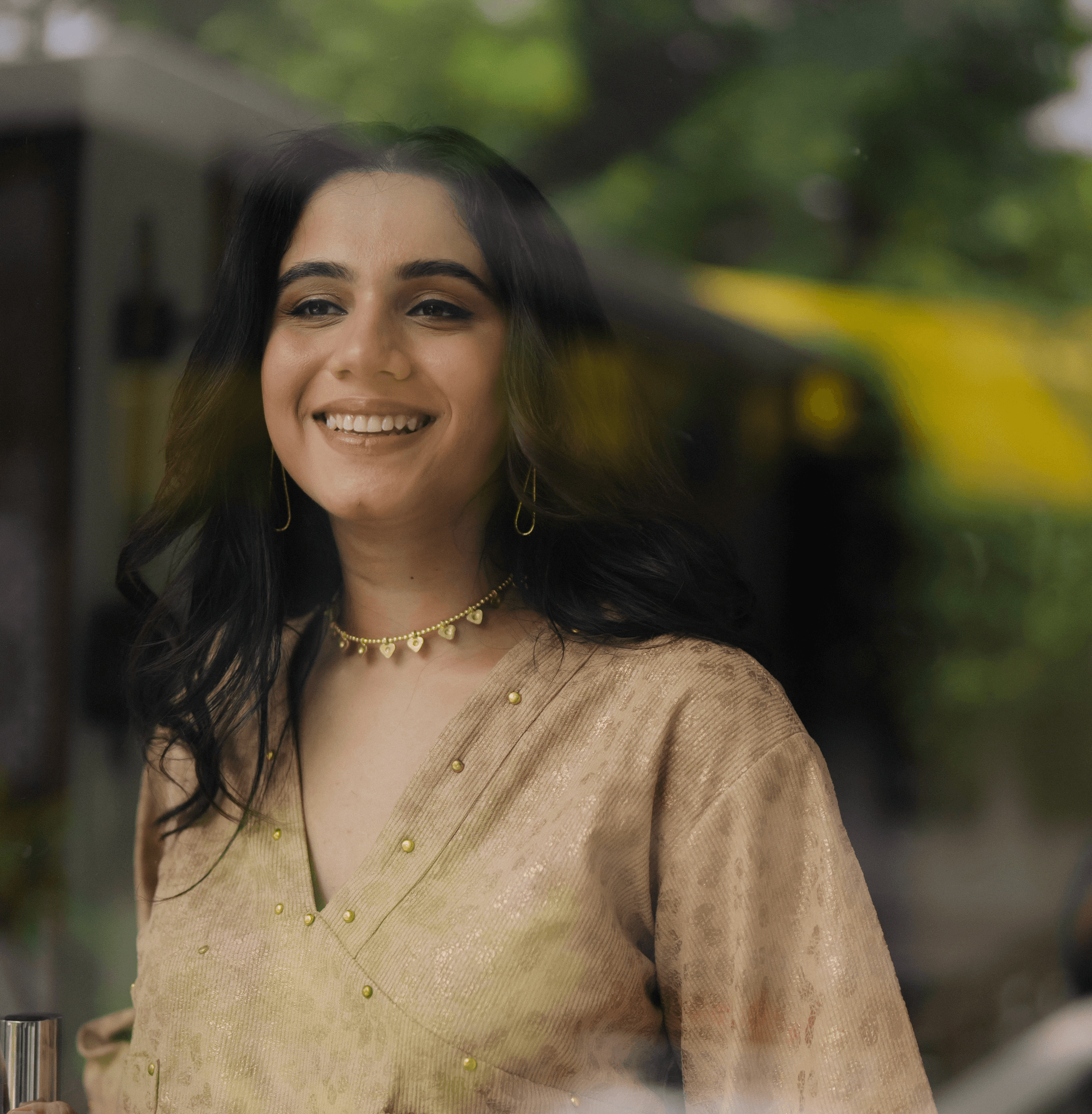 man filming on beach