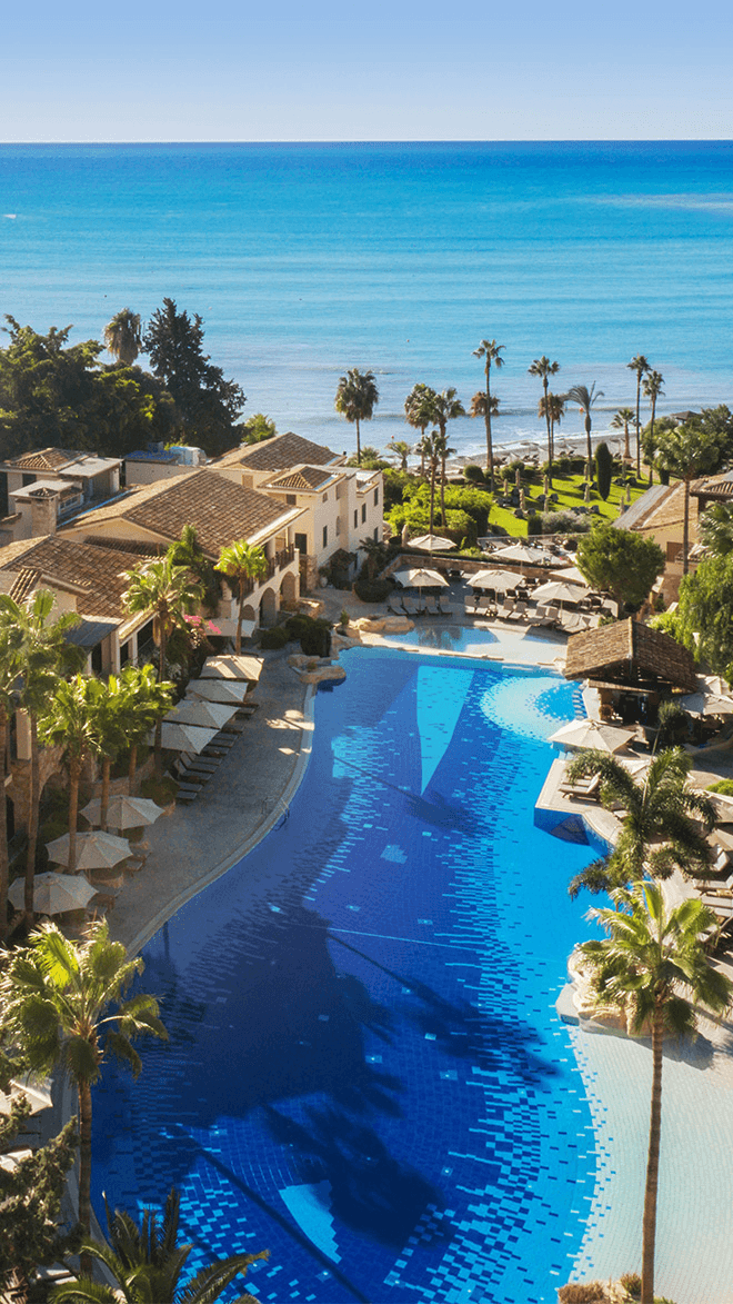 Resort hotel with large pool by the sea