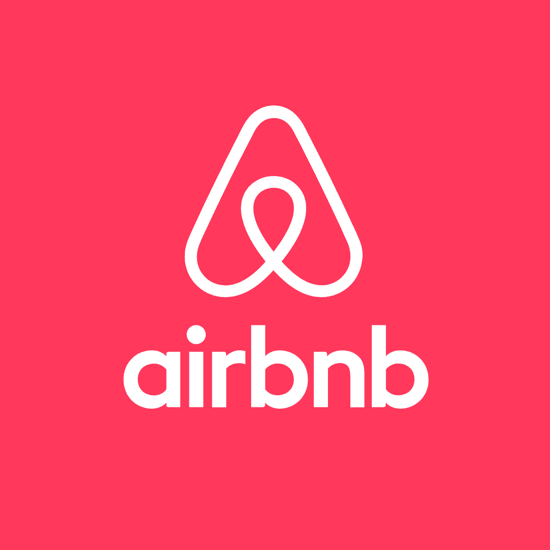 Red and white Airbnb logo icon, indicating properties managed and highly rated on Airbnb.