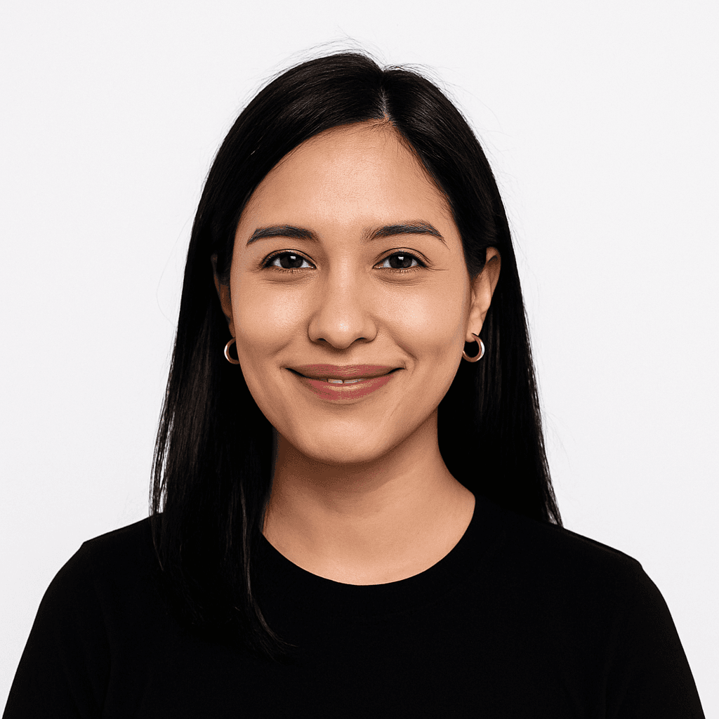 Woman with straight dark hair wearing a black top.