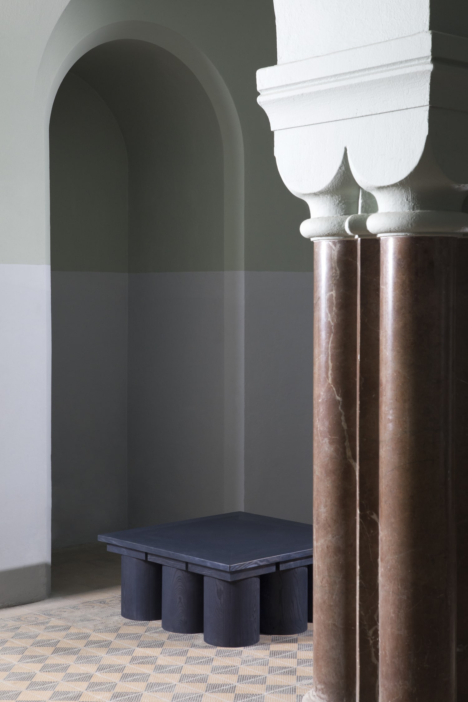 Veltrusy Mansion coffee table used in space emphasizing low horizontal mass and balance by Jiri Krejcirik