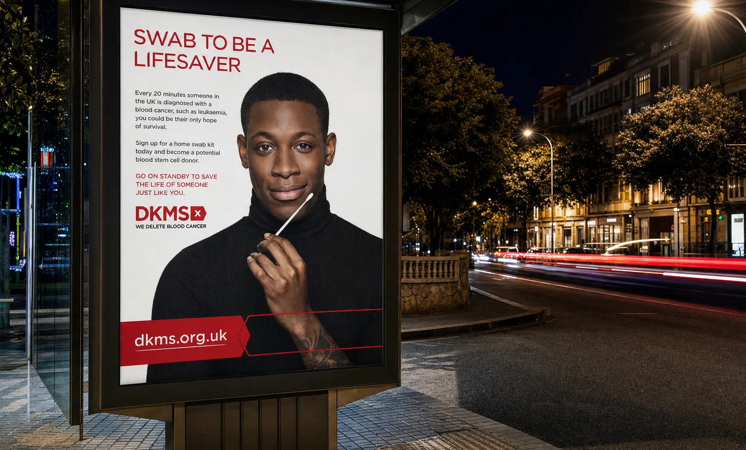 DKMS bus shelter poster Swab to be a Lifesaver showing Black man with cheek swab at night in UK street