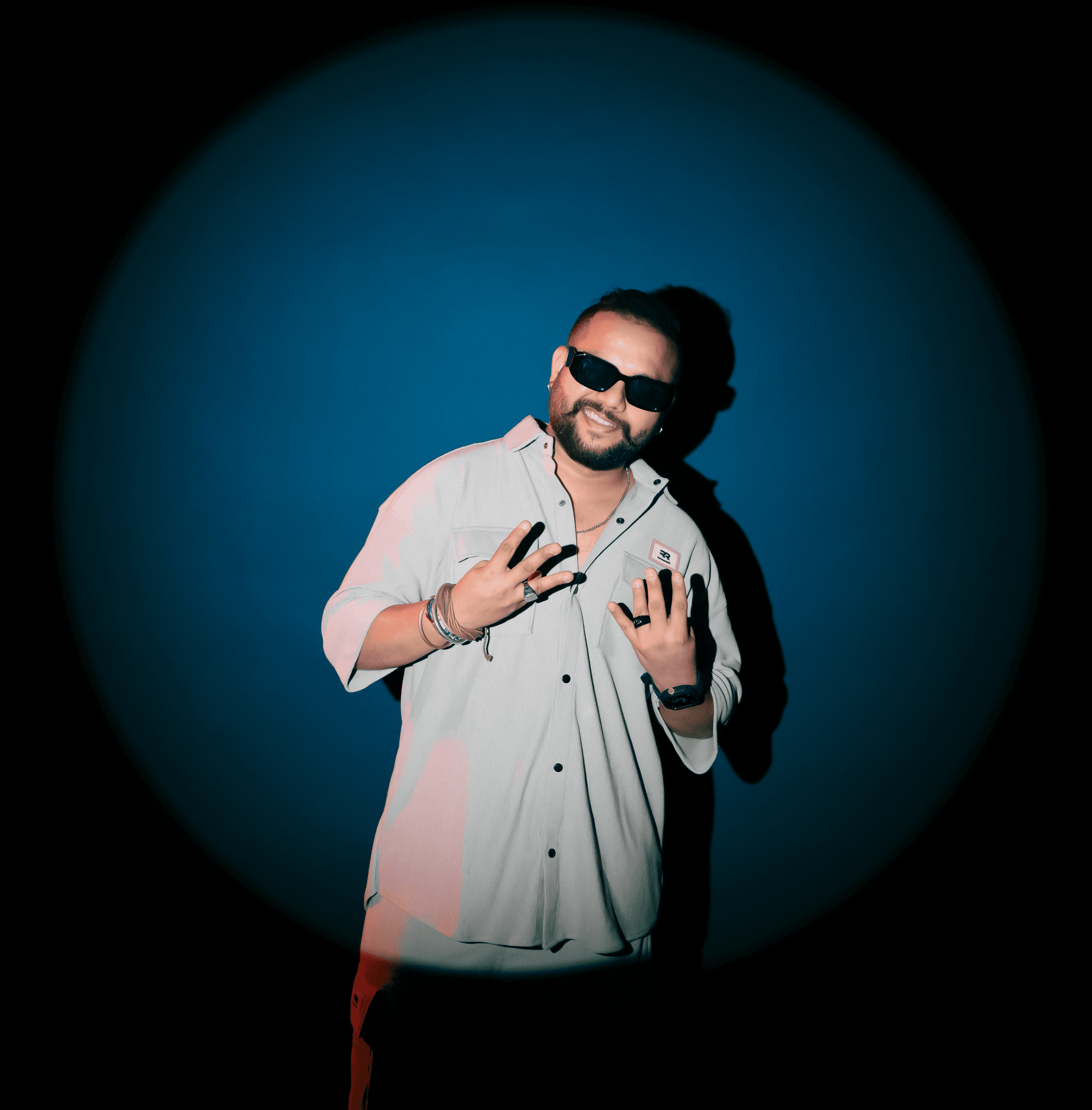 Music producer sitting in his studio