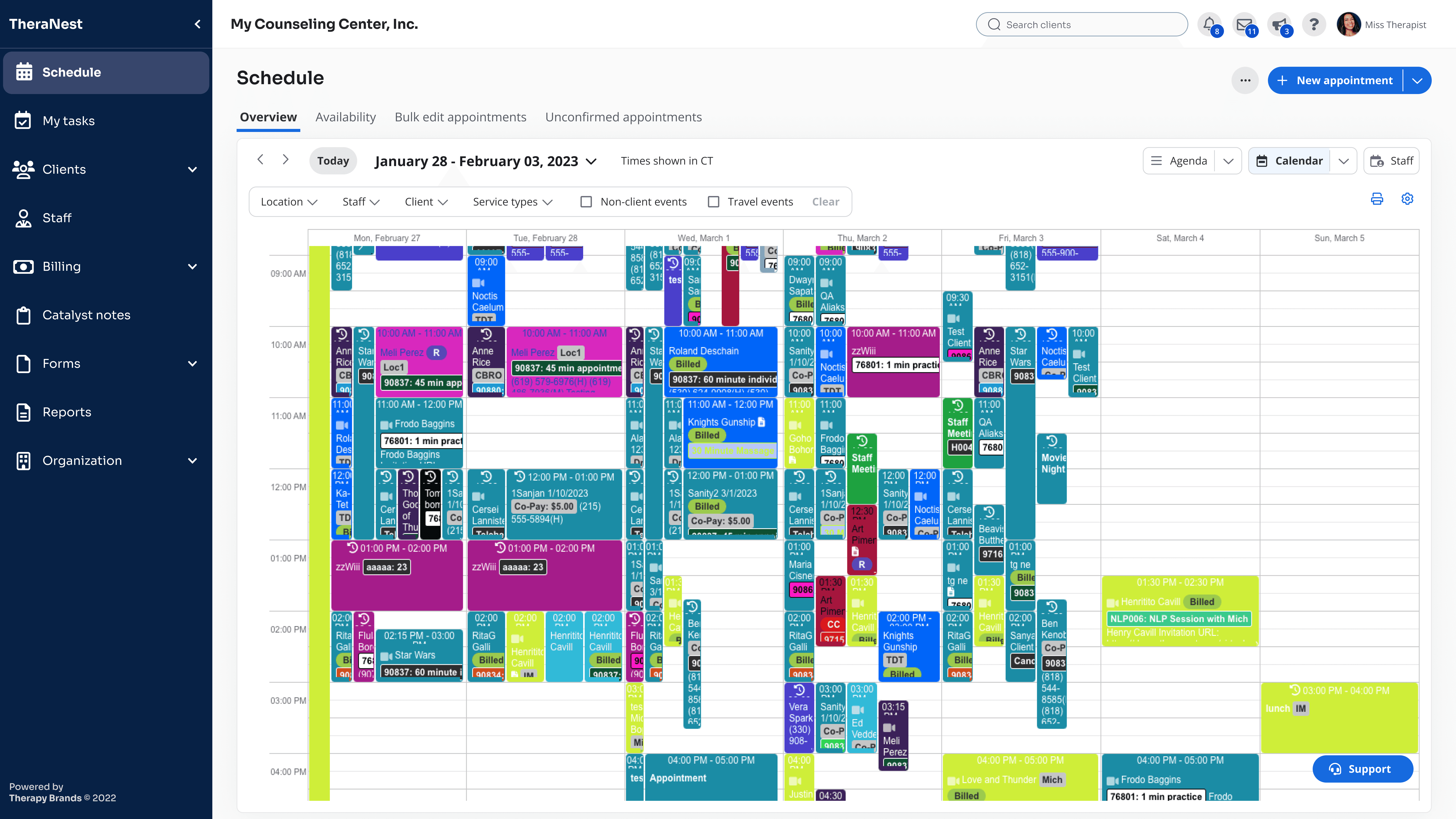TheraNest weekly calendar view with a highly populated schedule, displaying overlapping, color-coded appointments across several days and time ranges.