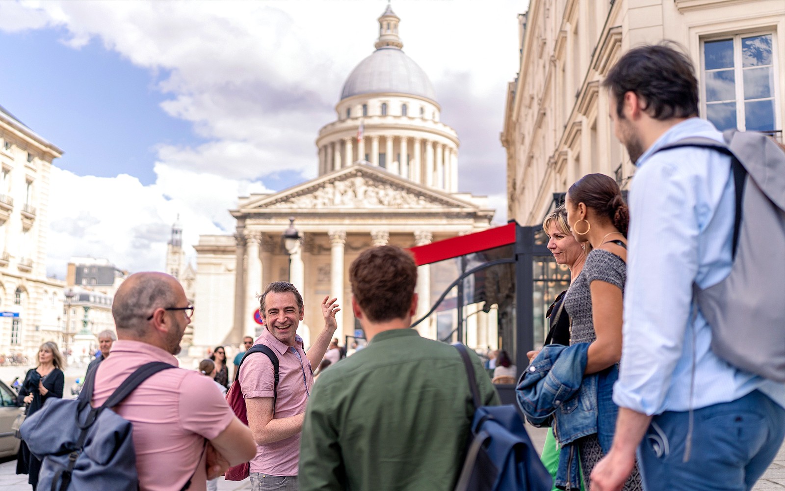 Tourists on a guided walking tour in the Latin Quarter, Paris, near the Panthéon.