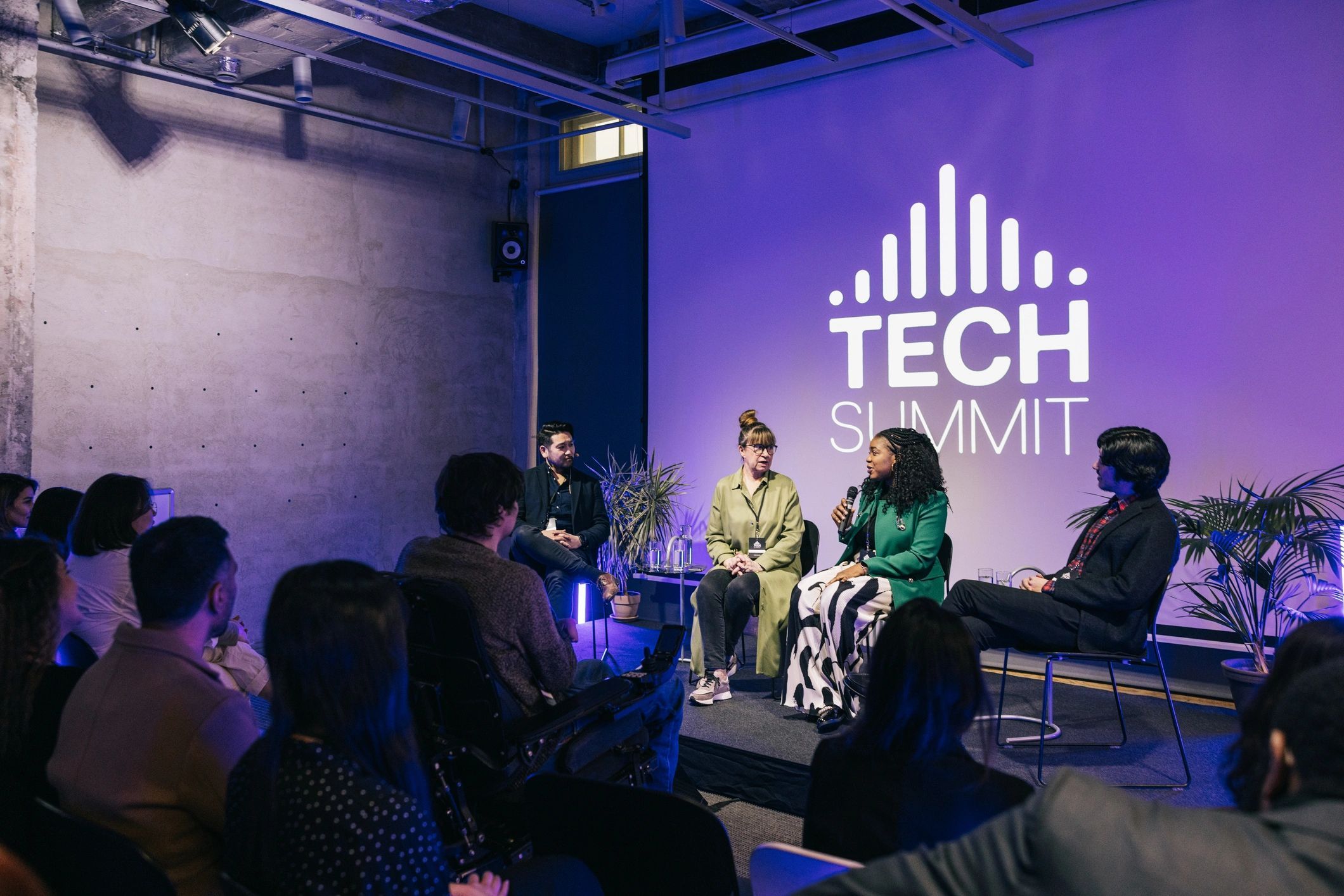 a black and white living room with a large tv