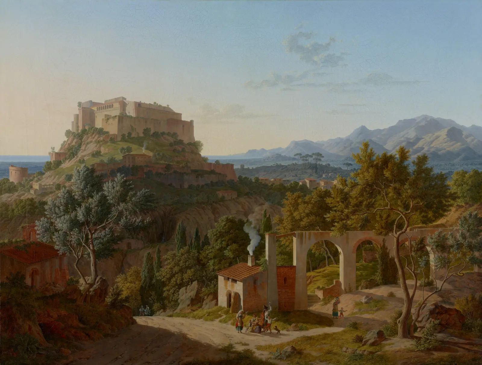 A painting depicting a late medieval castle standing on a hilltop overlooking small buildings, ruins, and olive and cypress trees.