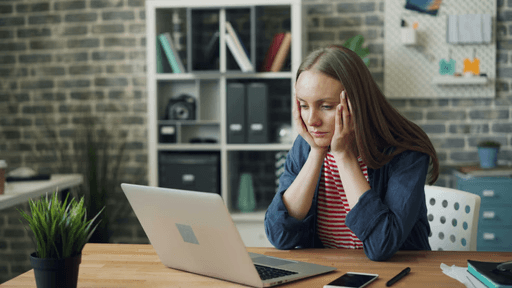 Woman working at a laptop