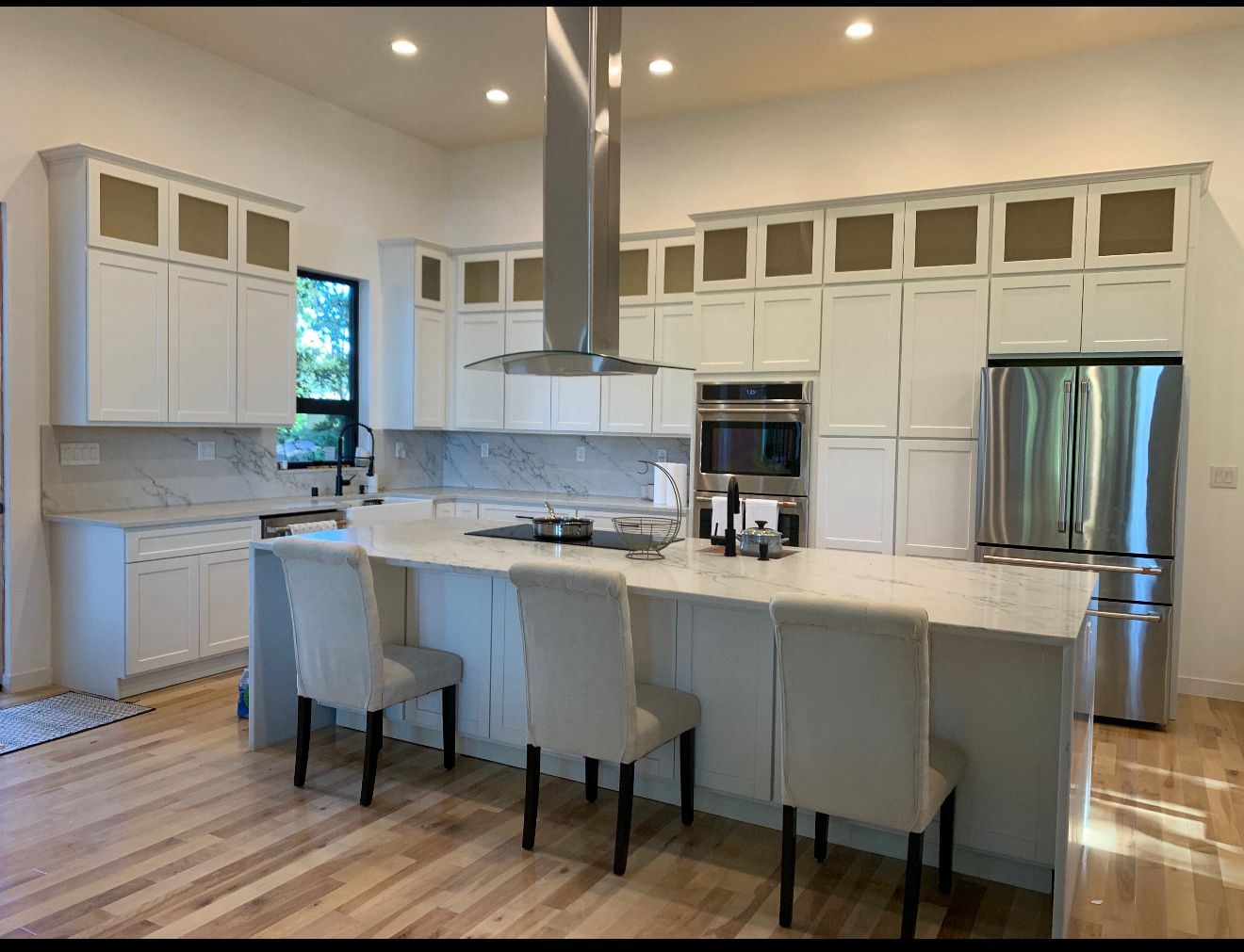 a large open kitchen and dining room area