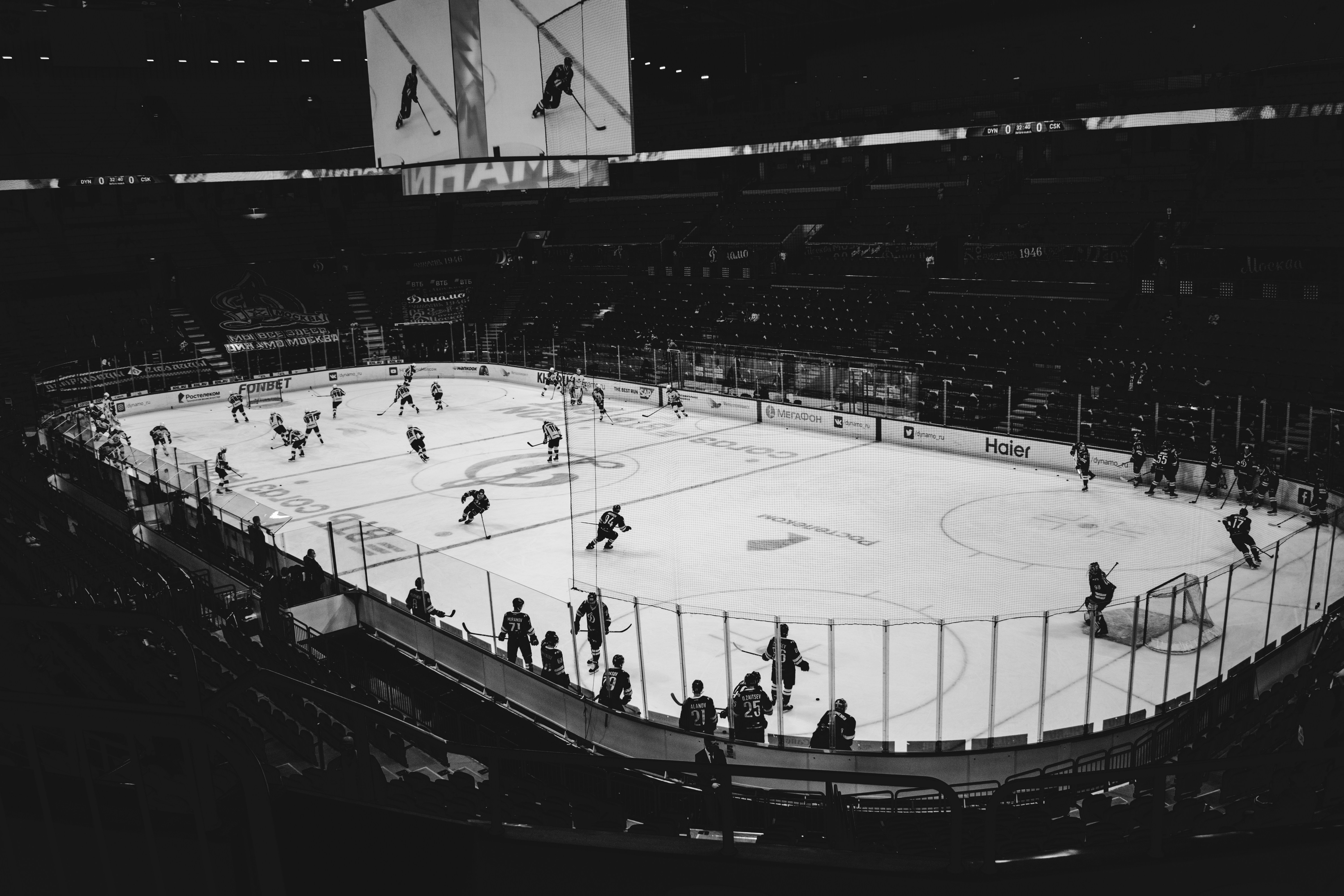 people playing ice hockey on stadium