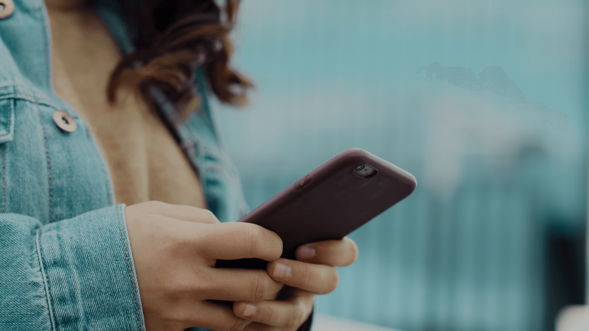 Woman using a phone.