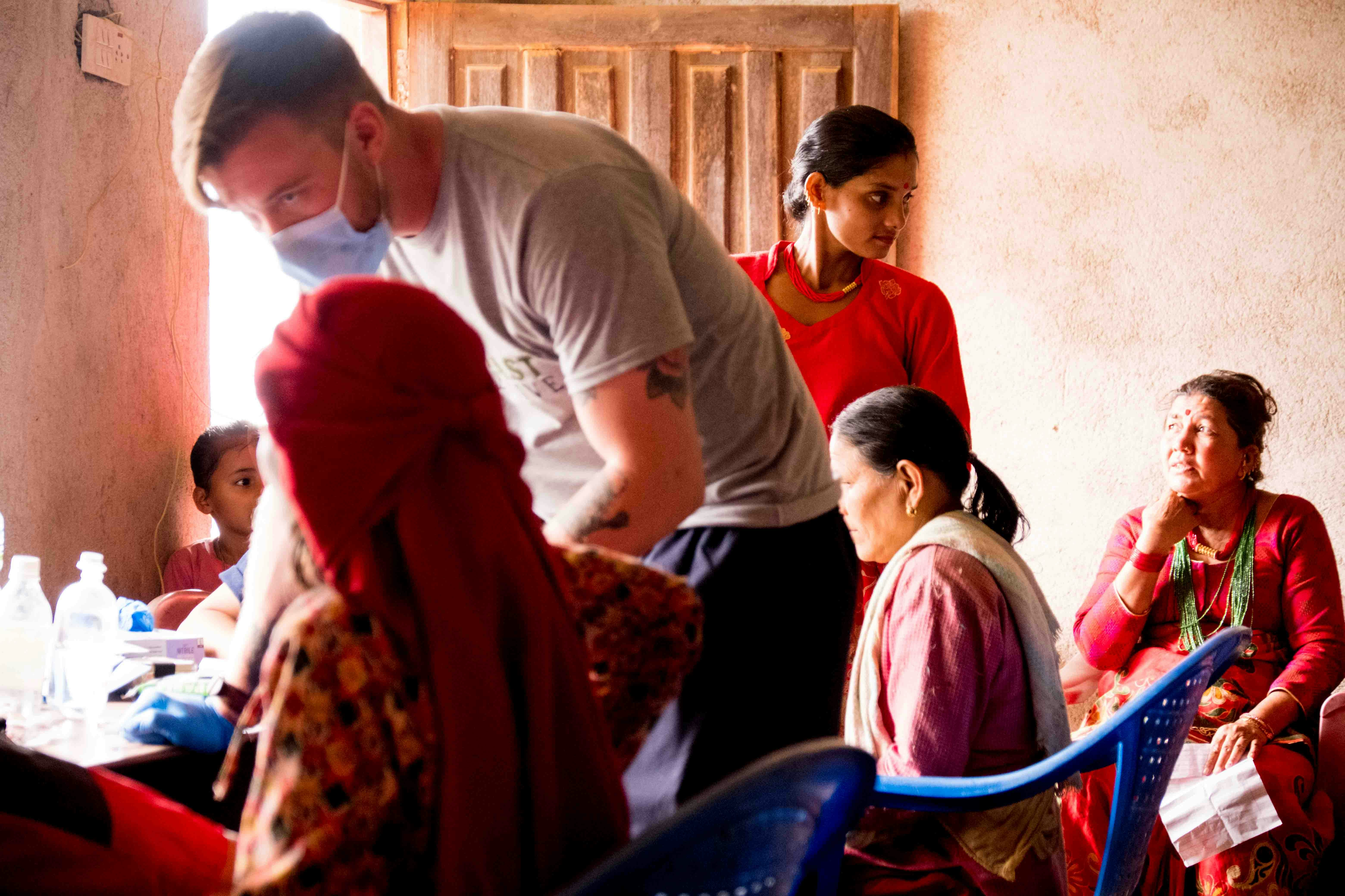 a group of people sitting around a table