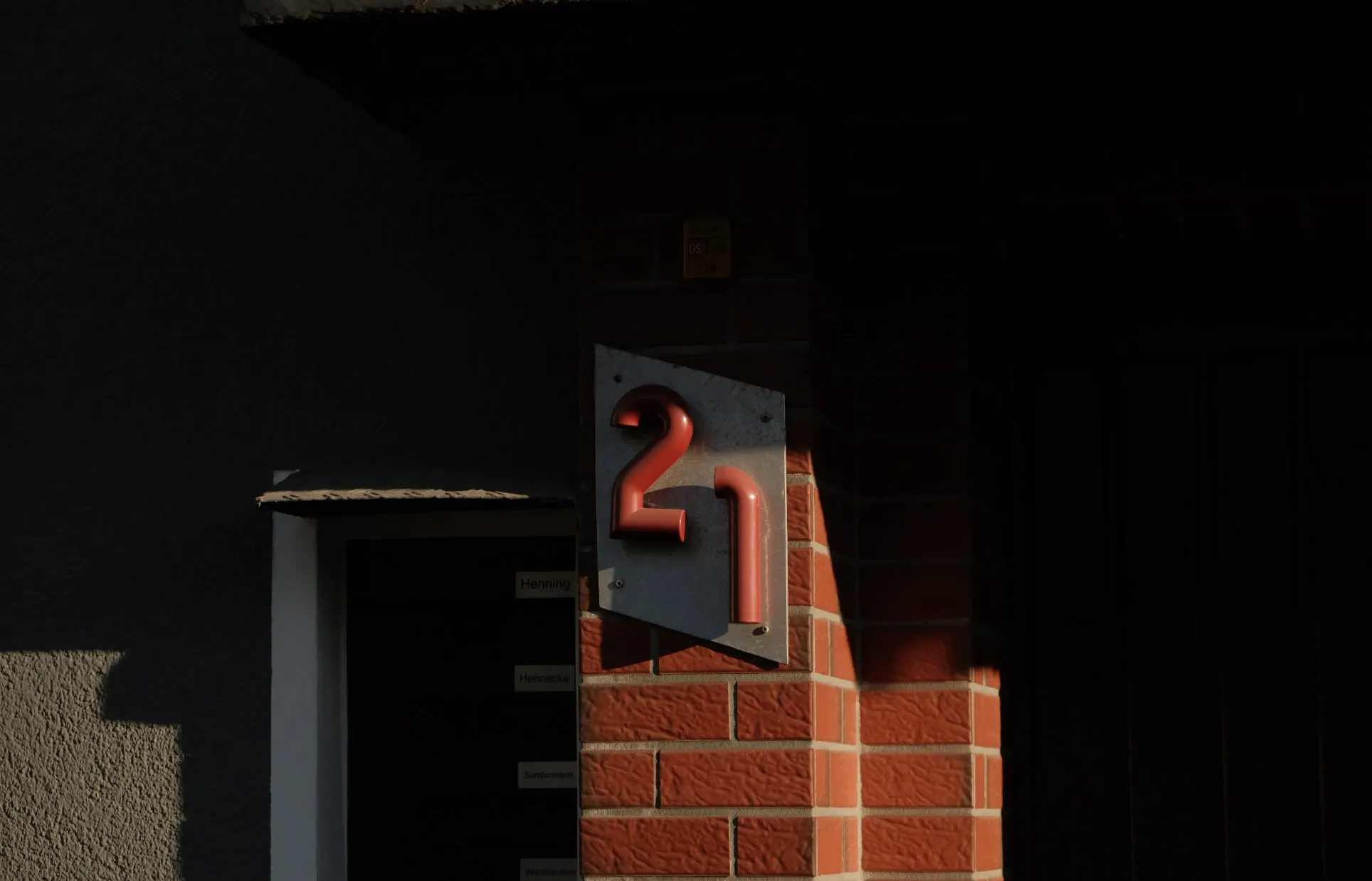 Building number 21 with high contrast with sunlight 