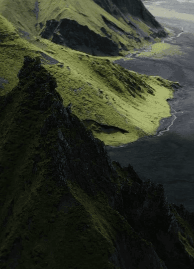 Person standing at a steamy food stall at night.