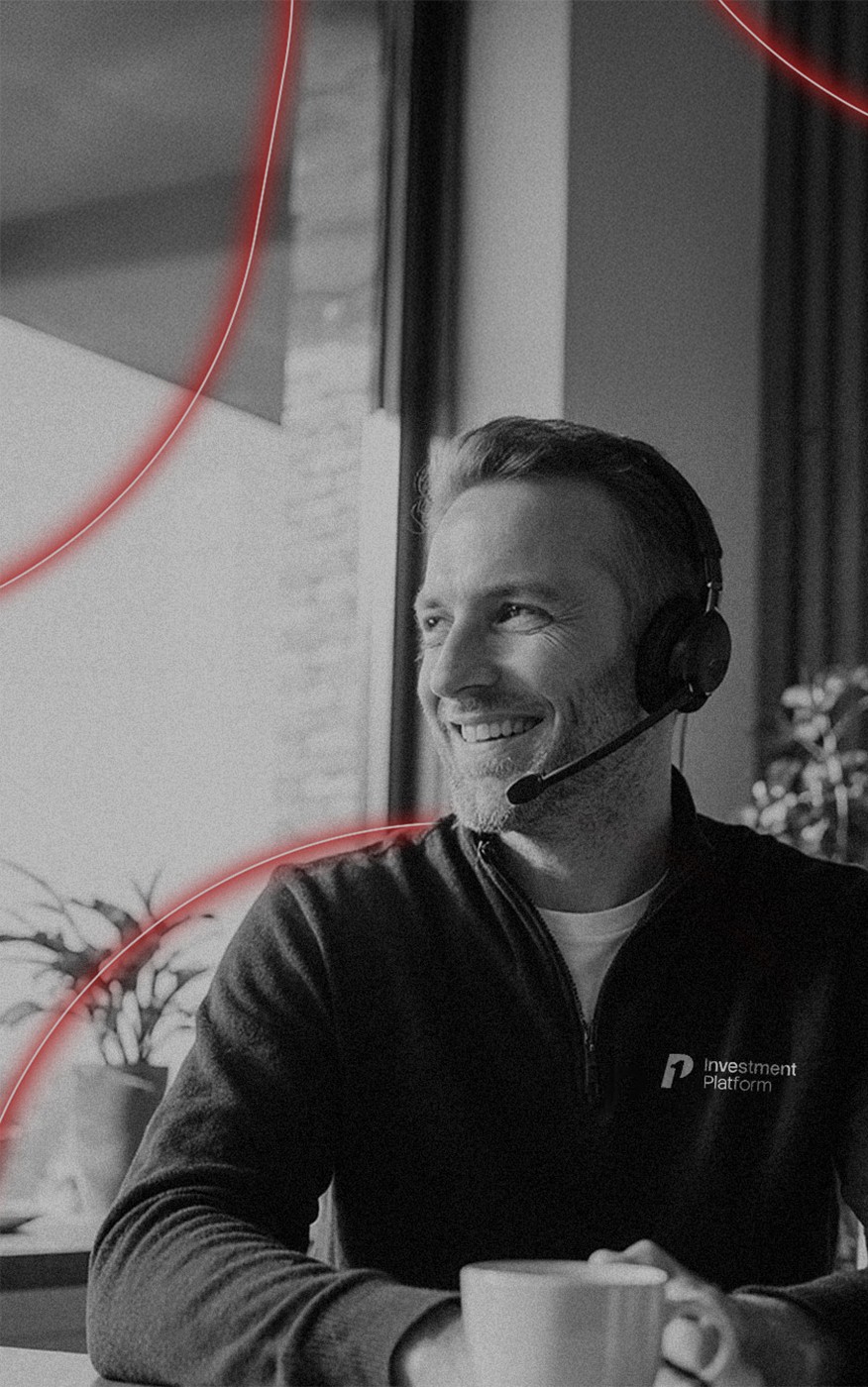 Smiling man disussing adopting the p1 platform with potential client