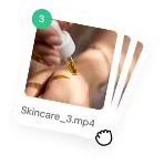 A hand dragging multiple files into an upload column.